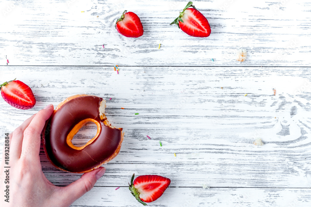 lunch with donuts on wooden table background top view mock up