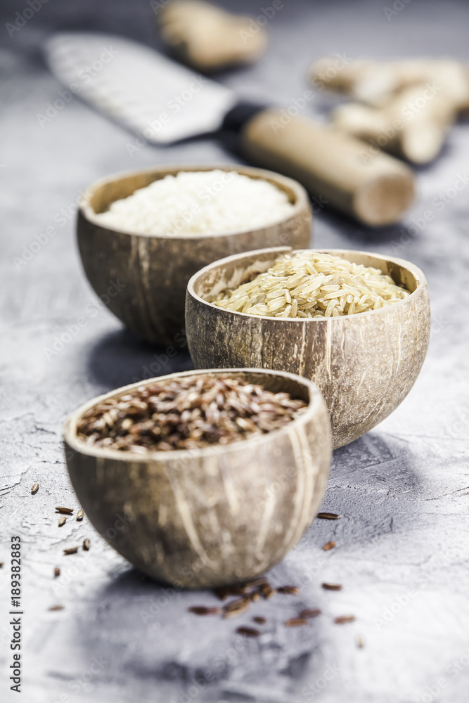 Assortment of different rice in bowls