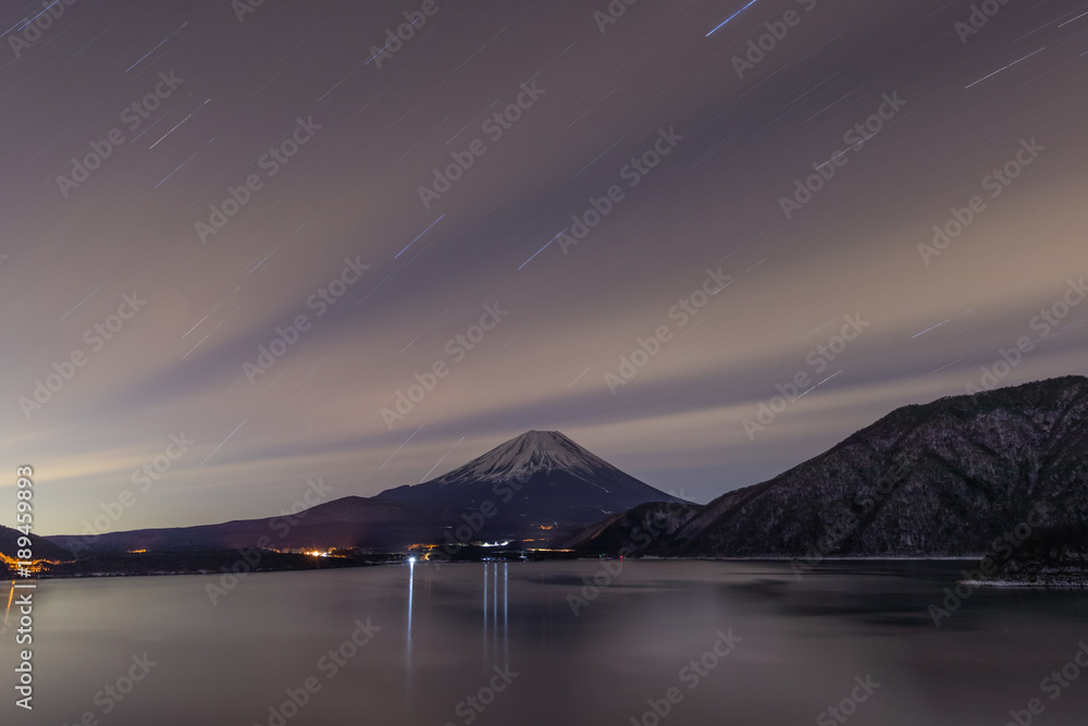 Lake Motosu and mt.Fuji at night time in winter season. Lake Motosu is the westernmost of the Fuji F