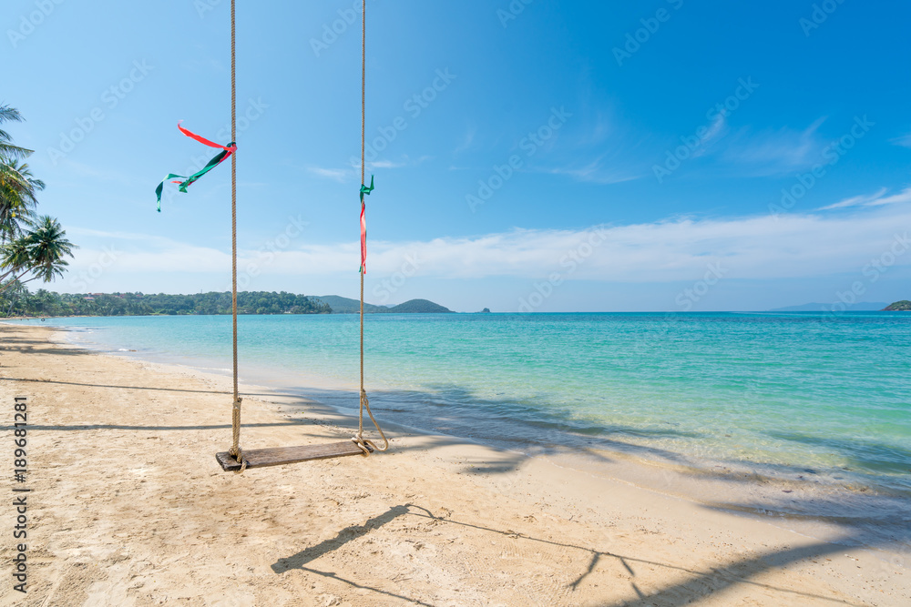 Swing hang from coconut palm tree over summer beach sea in Phuket ,Thailand. Summer, Travel, Vacatio