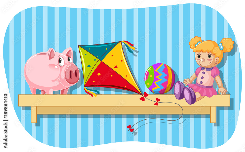 Piggybank and other toys on wooden shelf