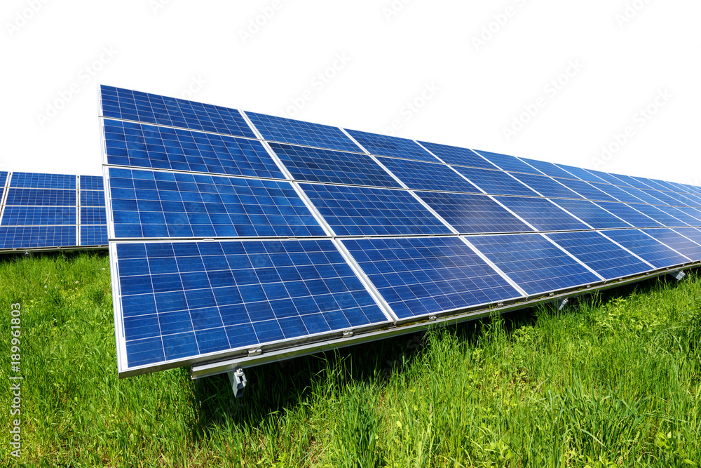 Solar panel on green grass isolated on white background. Alternative energy concept