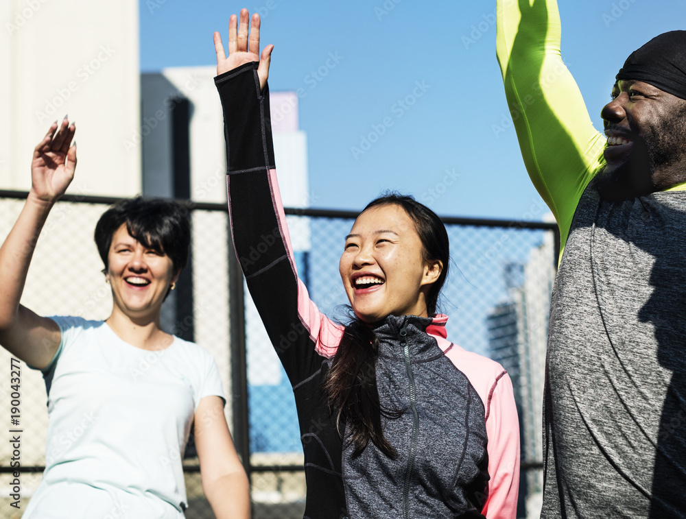 People exercising at fitness gym