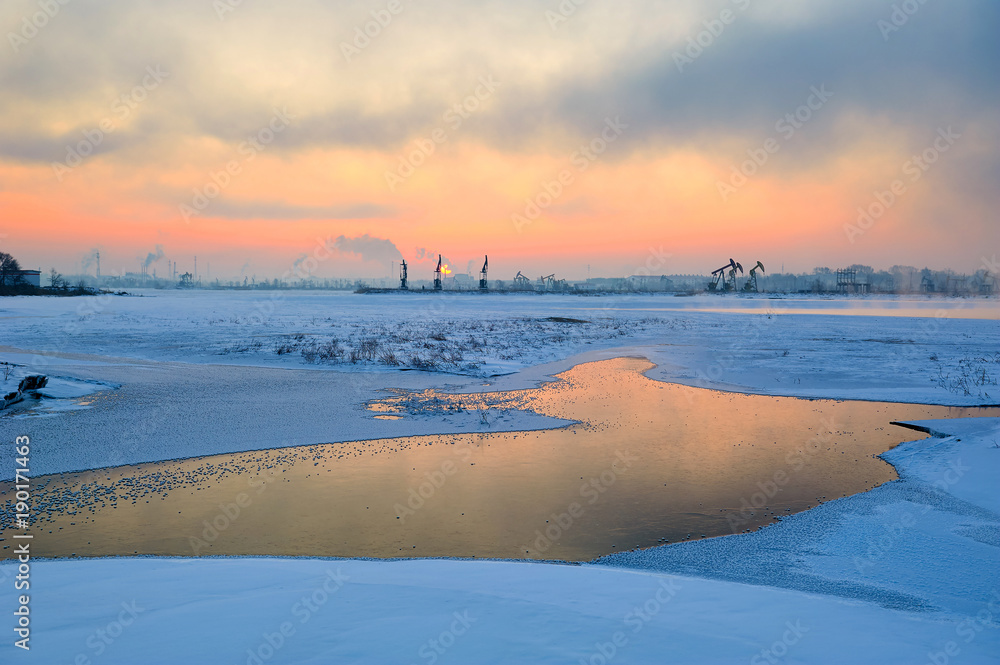 The winter lake sunrise landscape.