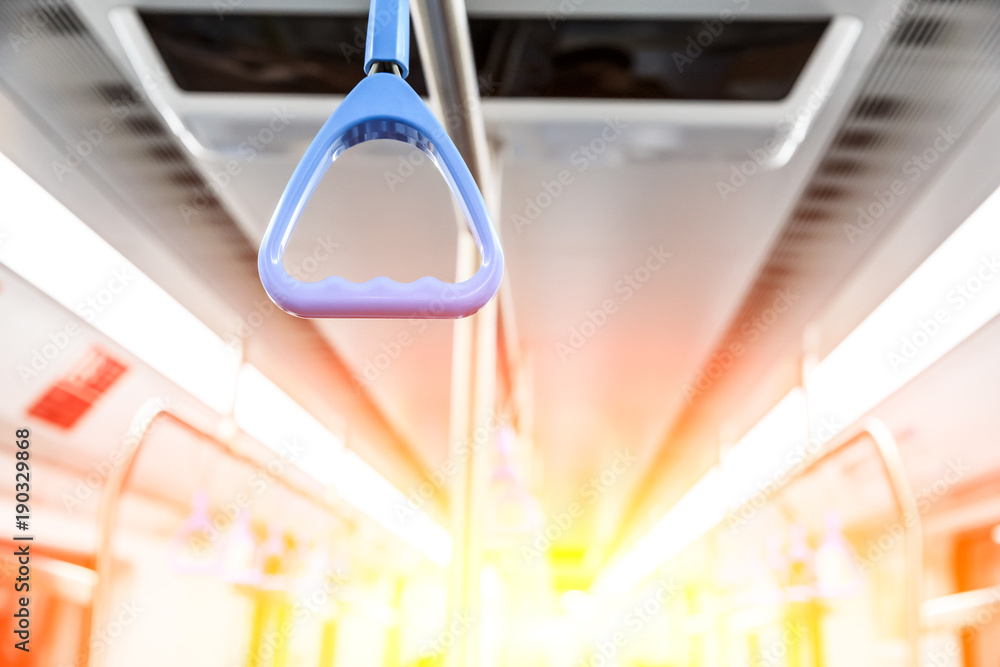 metro train interior handrails closeup