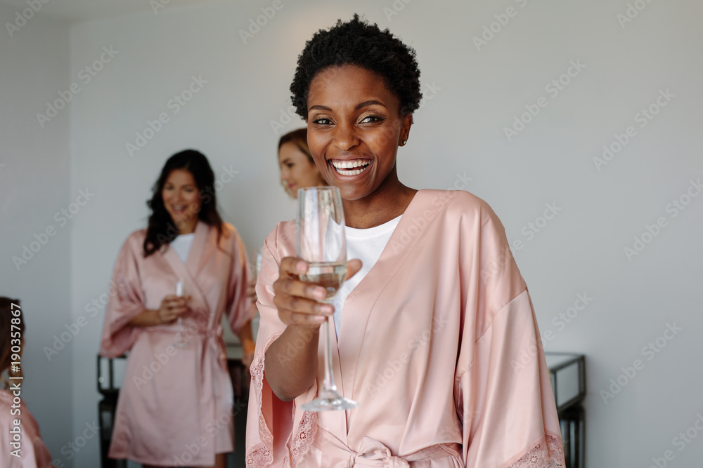 Cheerful woman at bachelorette party of a friend