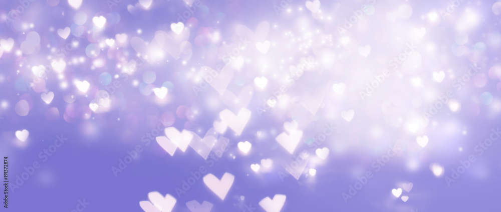 Beautiful shiny hearts and abstract lights background