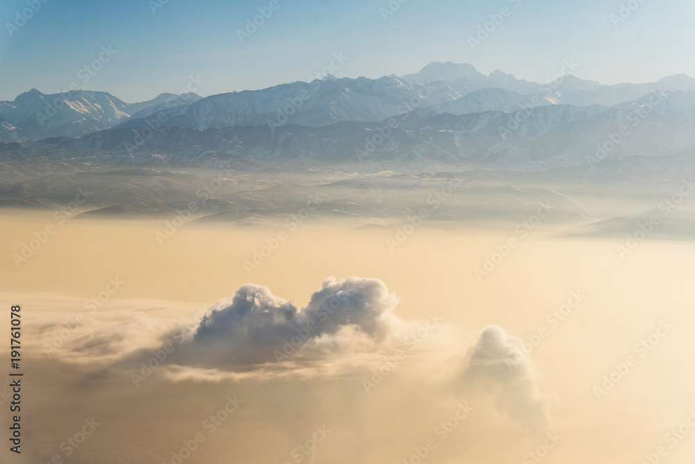 beautiful winter landscape of mountains with sky, clouds,