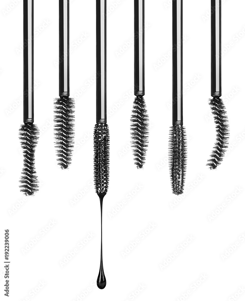 Set of various mascara brushes close-up on white background