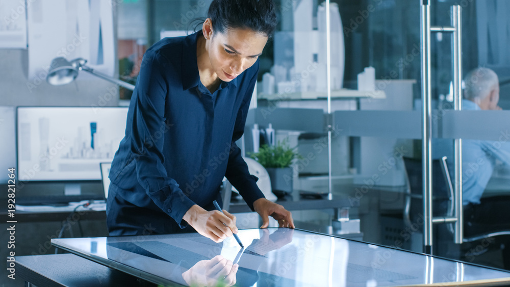 Talented Young Female Architectural Designer Draws Building Concept on a Graphics Tablet Display. Cl