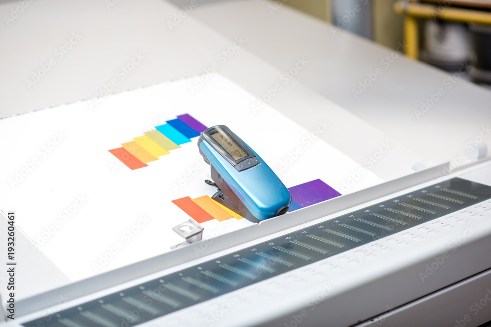 Spectrometer tool on the printing at the operating table of the printing plant