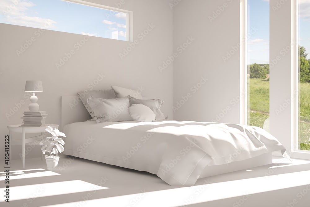 Inspiration of white minimalist  bedroom with summer landscape in window. Scandinavian interior desi