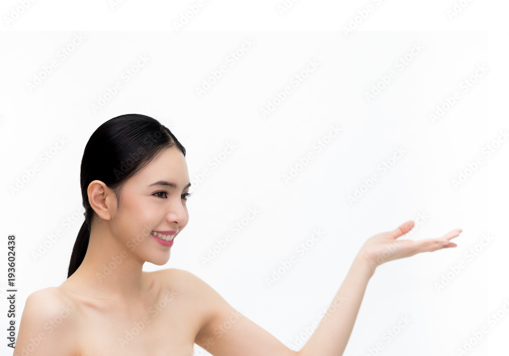 Young beauty Asian face, beautiful woman showing empty hand isolated over white background. Healthca