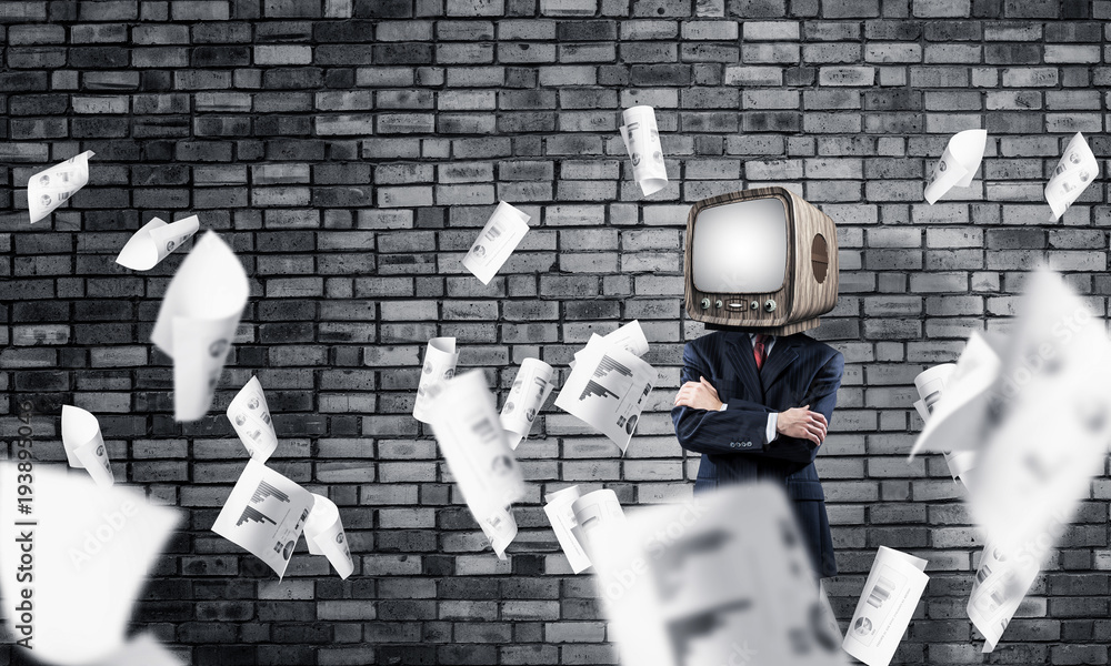 Businessman with old TV instead of head.