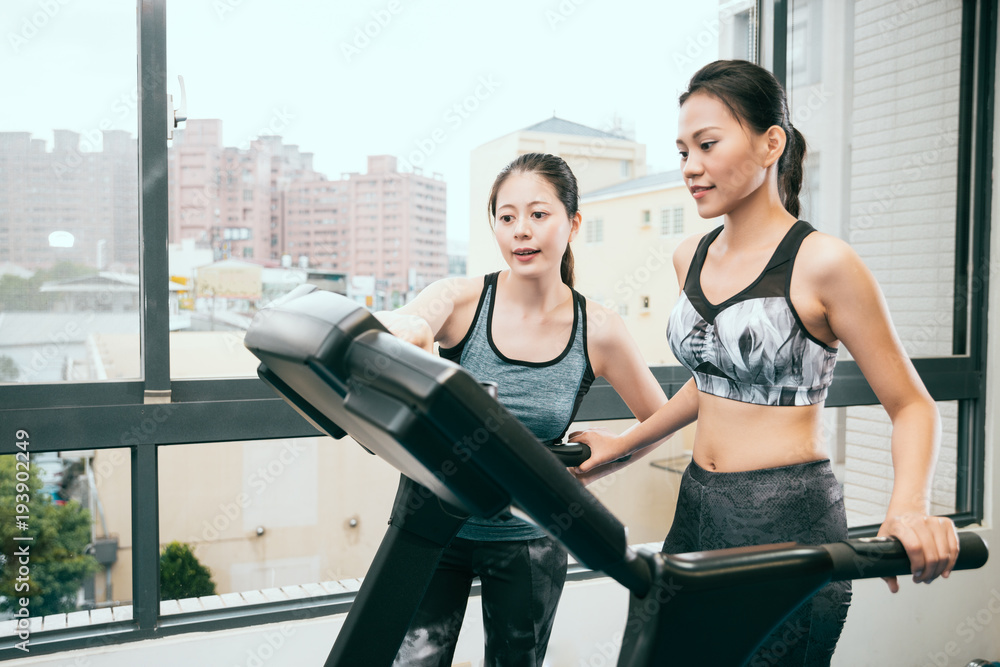 Asian instructor is teaching new runner