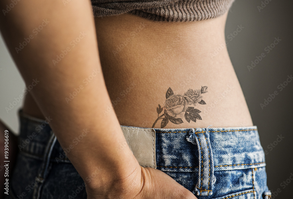 Closeup of lower hip tattoo of a woman