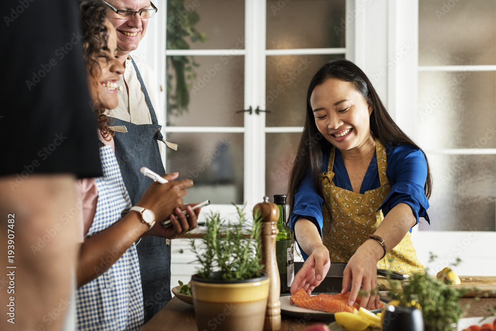 Diverse people joining cooking class