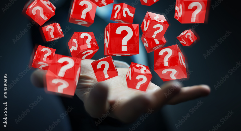 Businessman using cubes with 3D rendering question marks