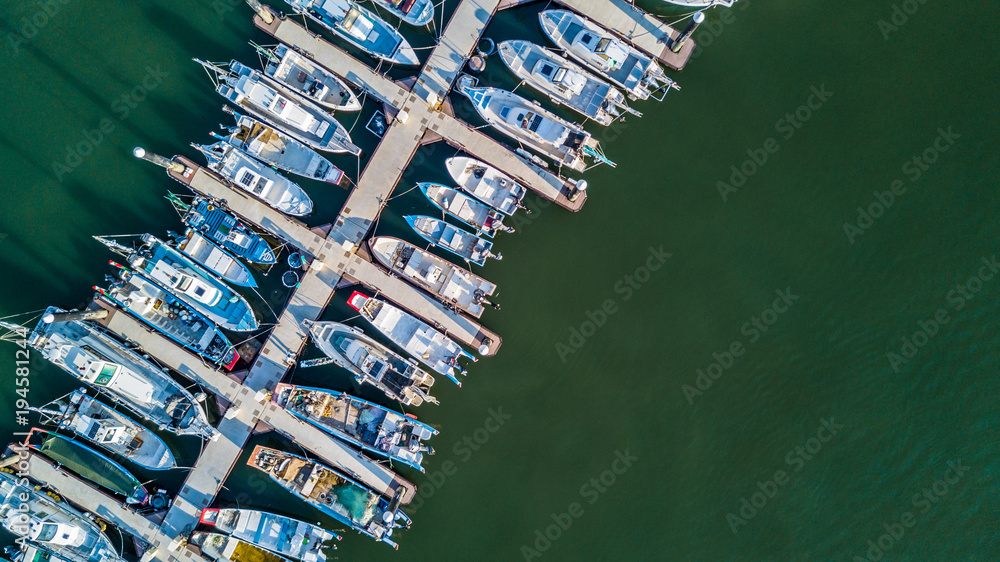 Aerial view Yacht parking, A marina lot, Yacht and sailboat is moored at the quay, Aerial view by dr