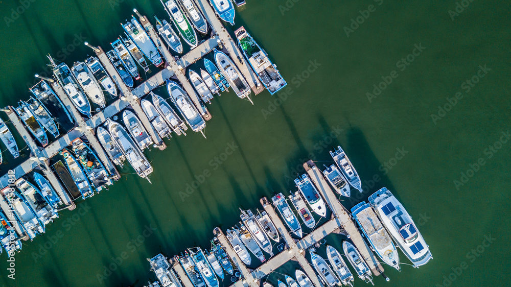 Aerial view Yacht parking, A marina lot, Yacht and sailboat is moored at the quay, Aerial view by dr