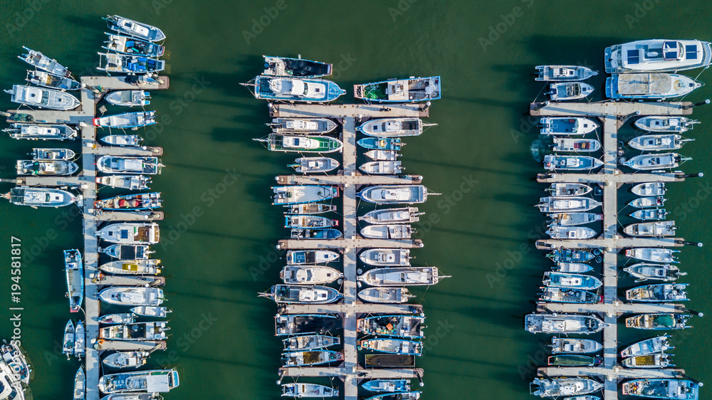 Aerial view Yacht parking, A marina lot, Yacht and sailboat is moored at the quay, Aerial view by dr