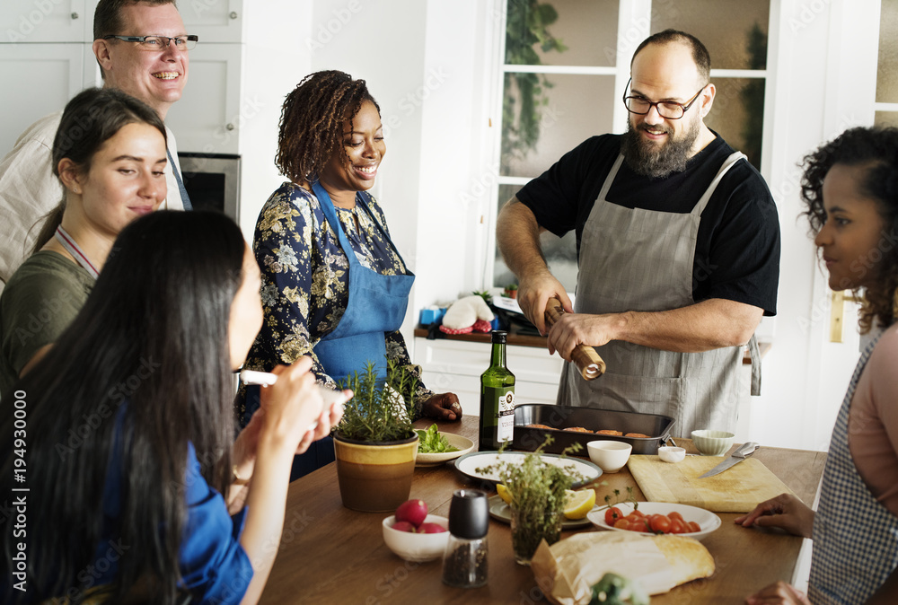 Diverse people joining cooking class