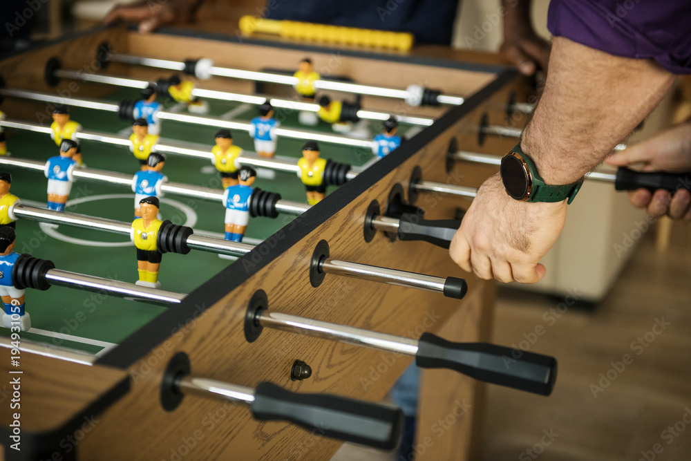 People playing table football