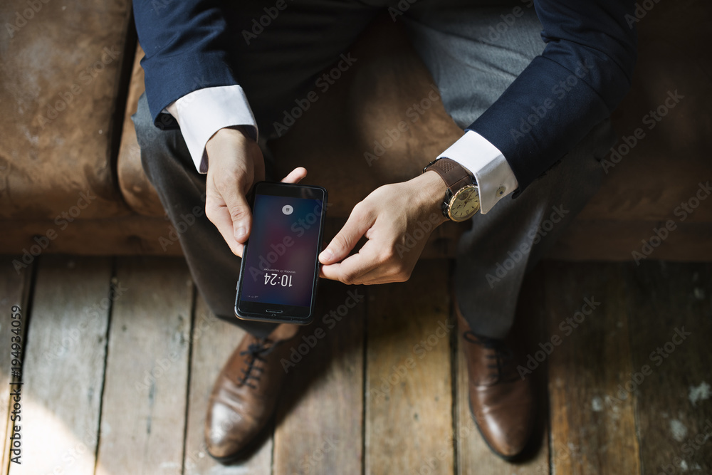 A businessman using a smartphone