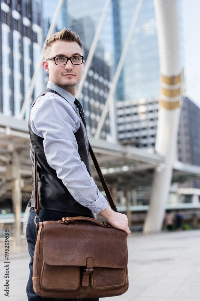 smart handsome business man outdoor with urban city background