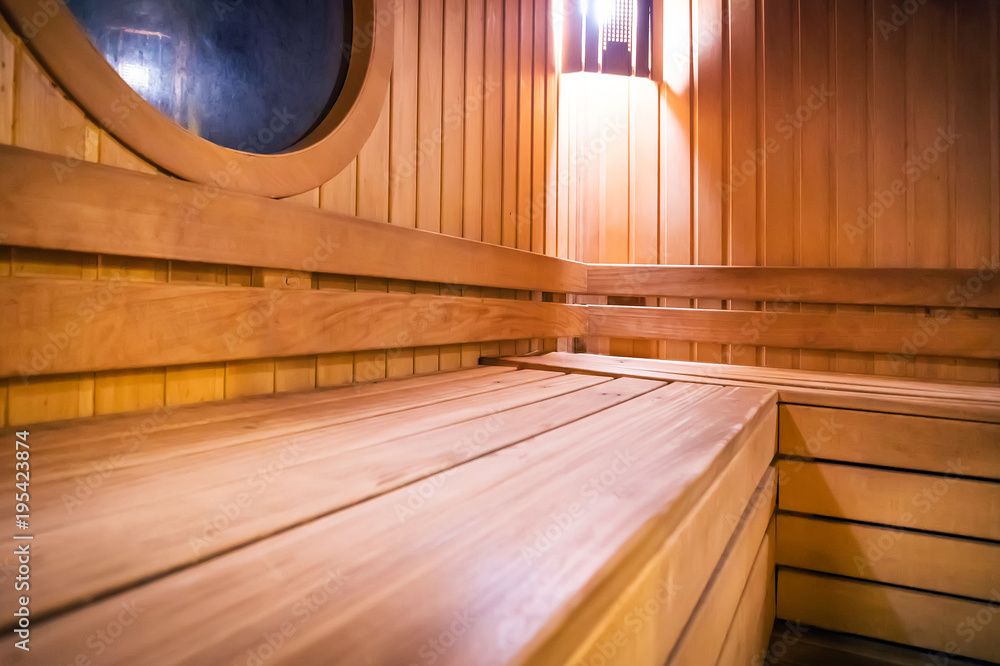 Wooden russian bathhouse sauna benches in hospital recreational room,