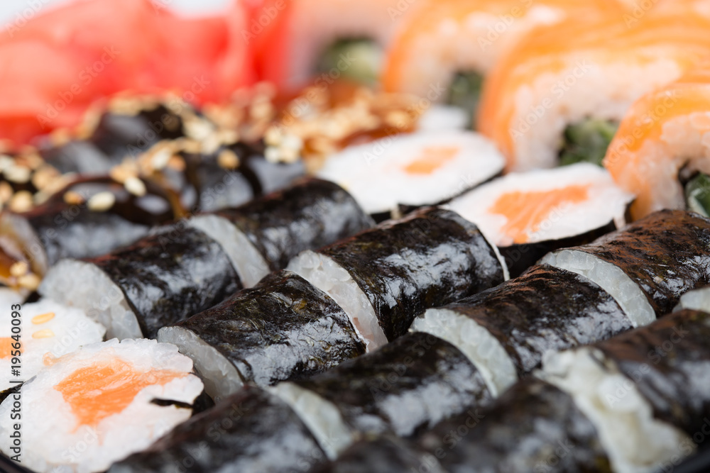 Salmon and caviar rolls served on a plate