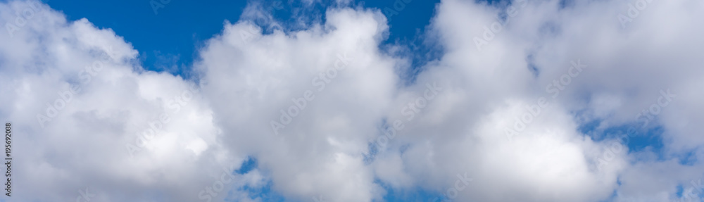 Panoramic view of white clouds in blue sky