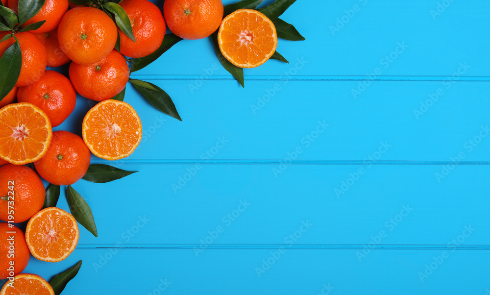 Orange on wooden background.