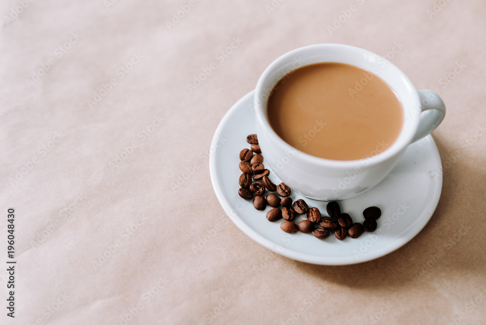 Coffee with beans on the side.