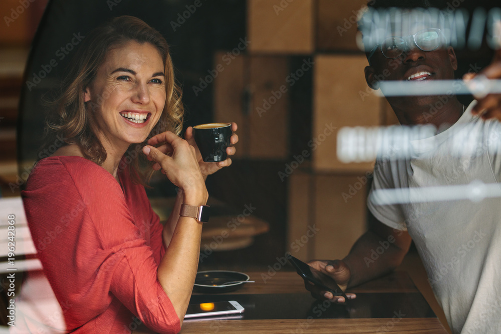 Friends meeting at a coffee shop