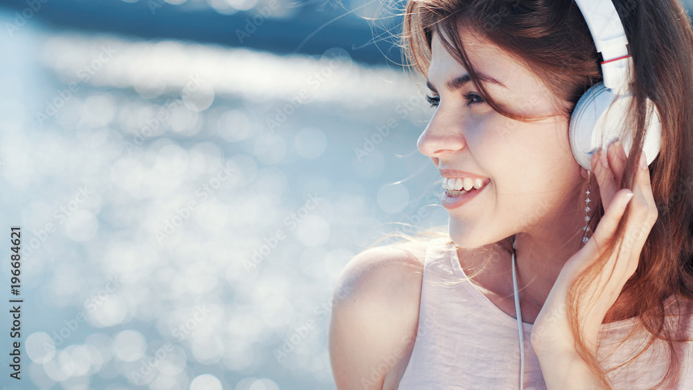 Smiling woman listen to music