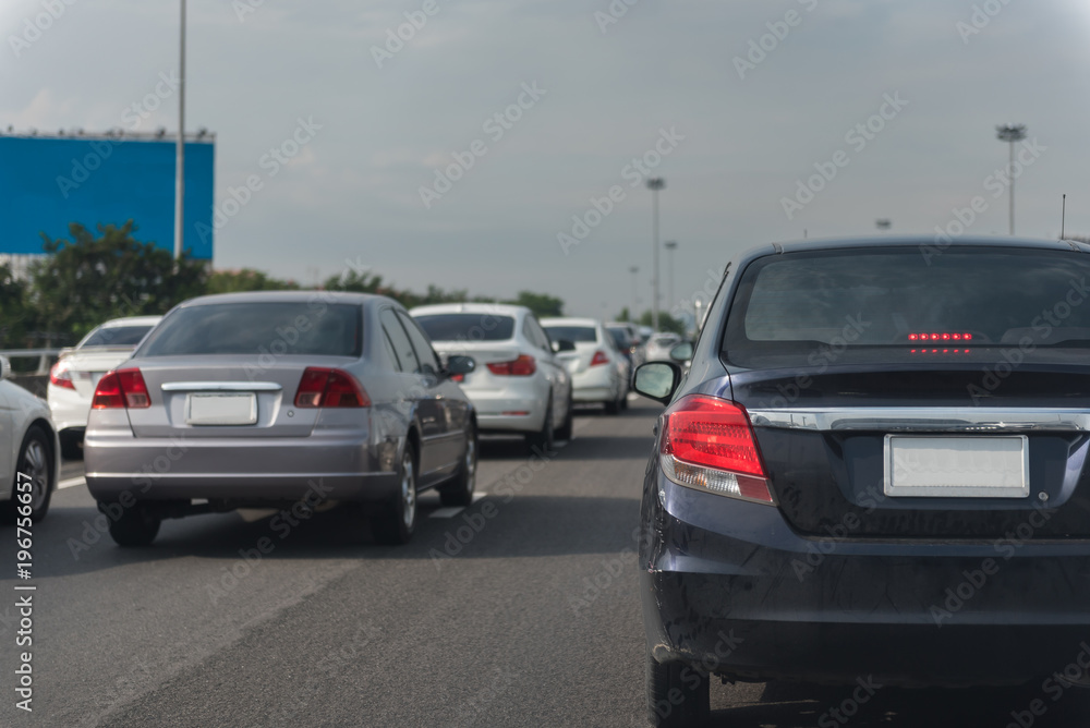 traffic jam with row of cars on toll way