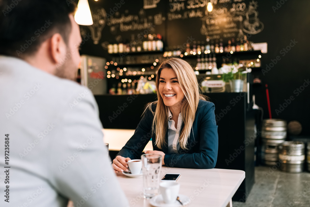 Having a good time on first date at the cafe.