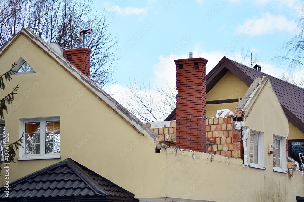 Rebuilding a family house and adding an extension.