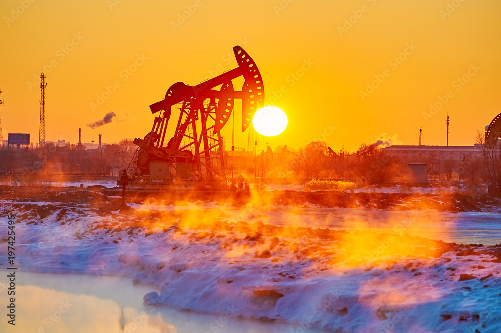 The oil fields sunrise landscape.