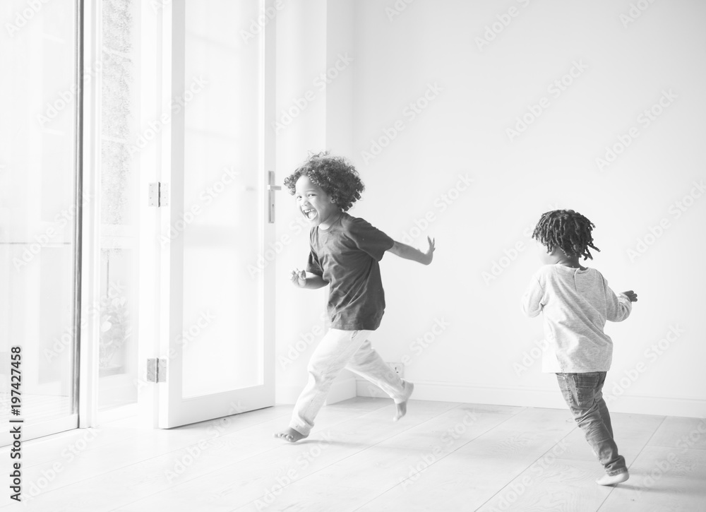 Young black boys polaying in their new house