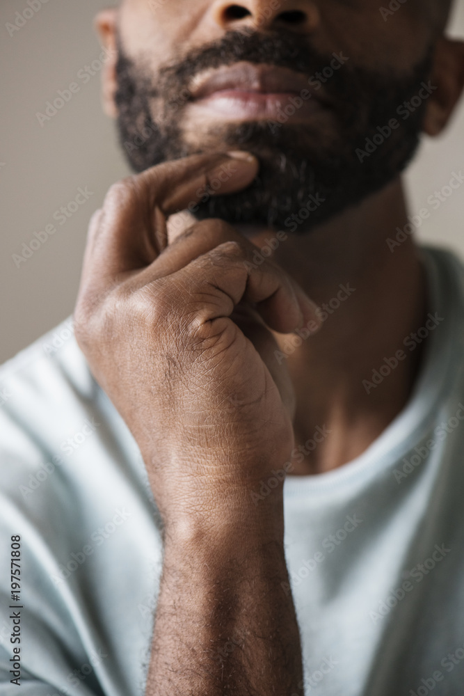 Black man thinking and contemplating concept