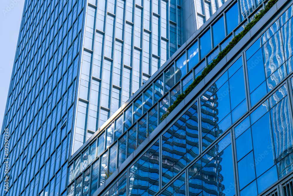 A skyscraper from a low angle view in the modern city of China