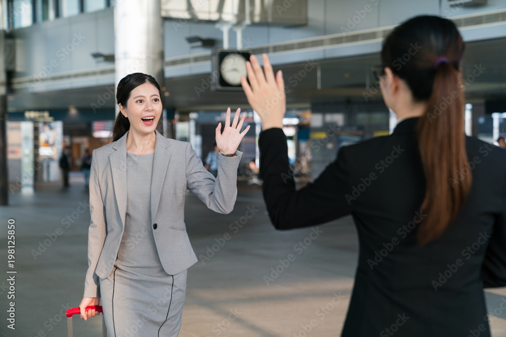 Office lady says hello to each other.