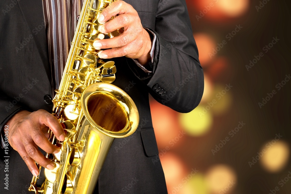 Ð¬an playing on saxophone