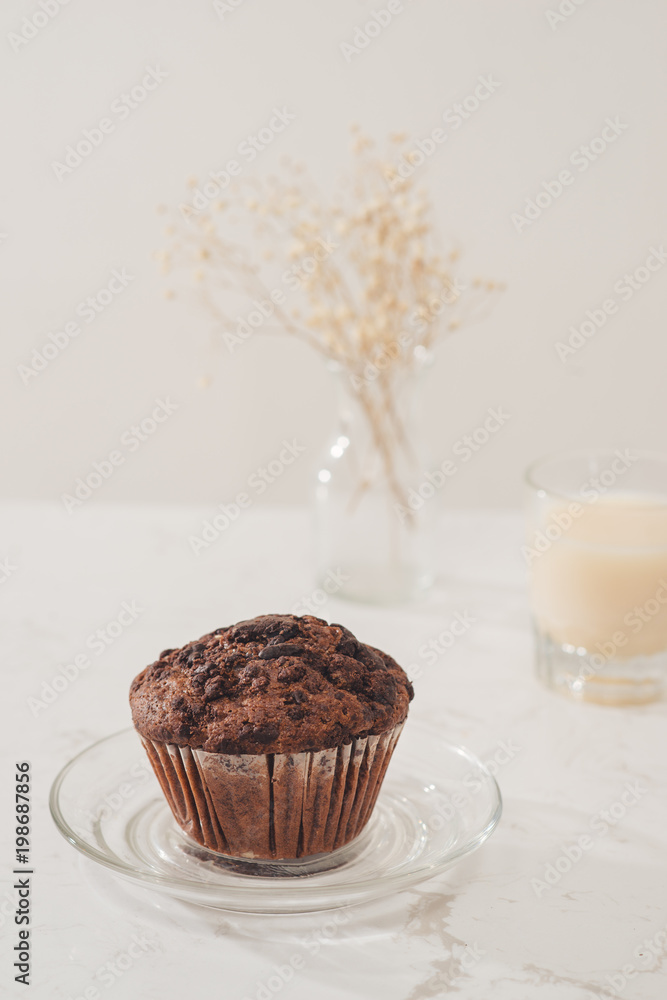 Dellicious homemade chocolate muffin on table. Ready to eat.