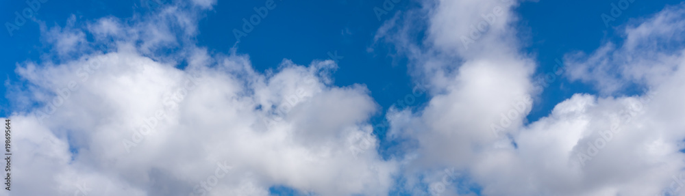 Panoramic view of white clouds in blue sky