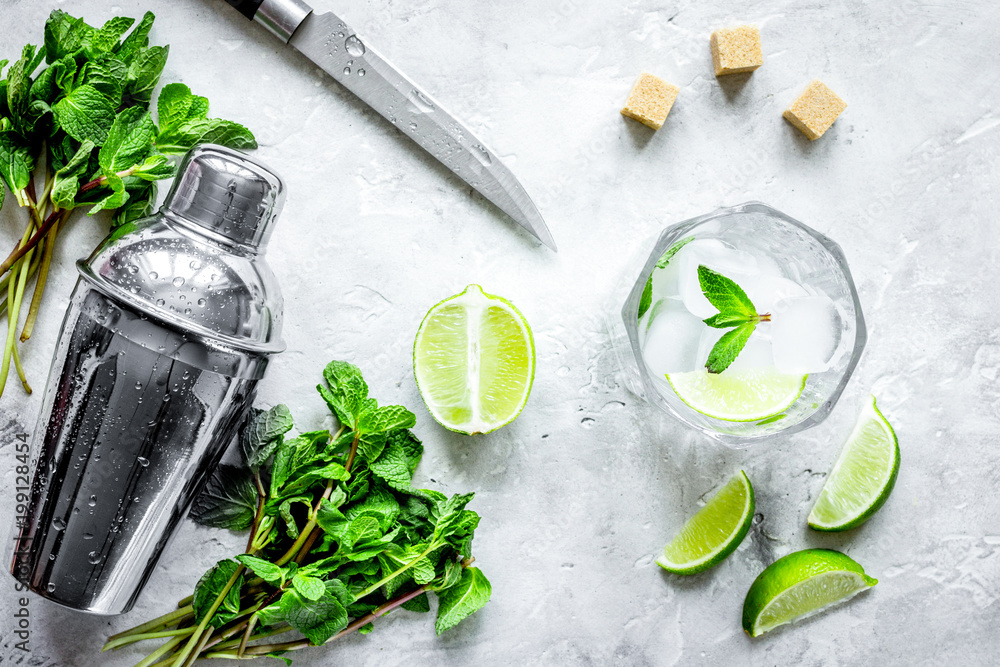 making mojito on stone background top view