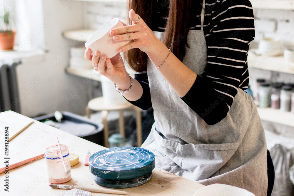 workshop production of ceramic tableware product painting