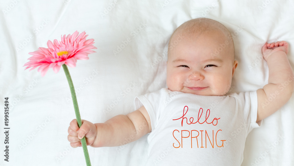 Hello Spring message with baby girl hold a flower（你好，抱着花的小女孩的春天短信）